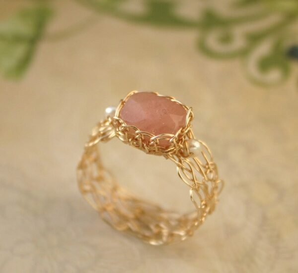 17bc9de6349e5427e7d6d55db0a840ac Image depicting a 14 carat demi-fine ring