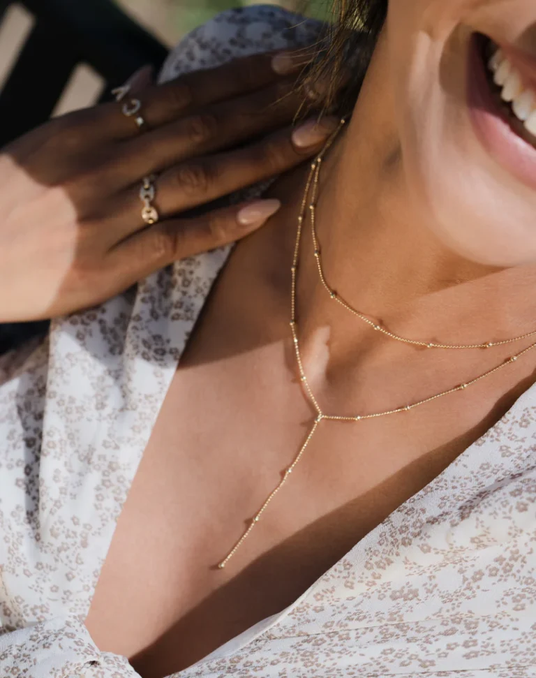 image depicting a woman wearing necklace