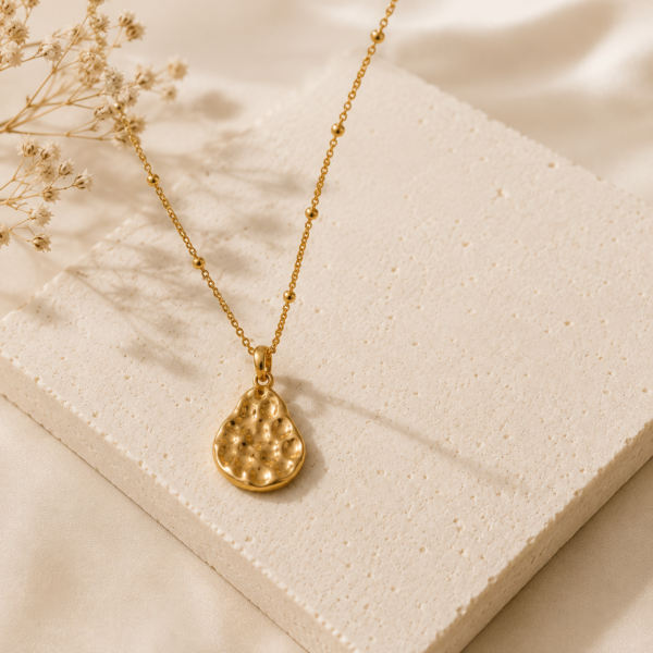 Image depicting an 18k gold necklace
